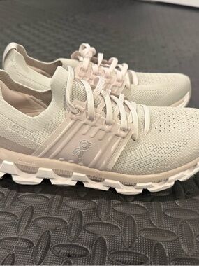 On Running Cloudswift Women's Athletic Shoes in Pale Beige and White